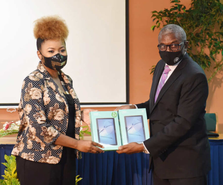 Why is TATT buying tablets for students?