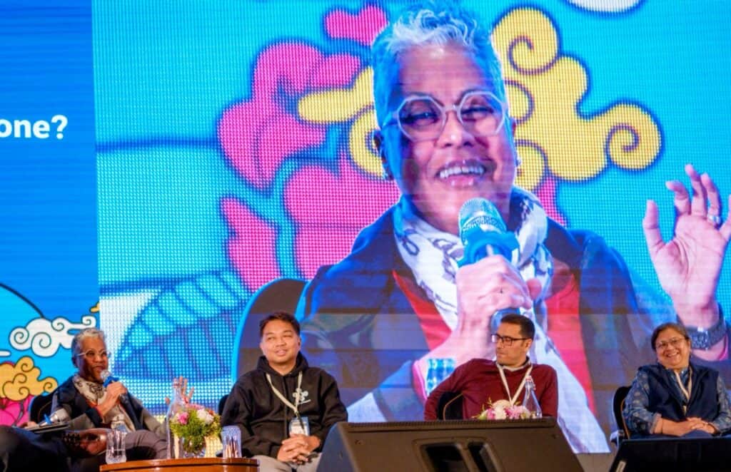 George Popplewell, bottom left, speaking at the 2024 Global Voices summit.